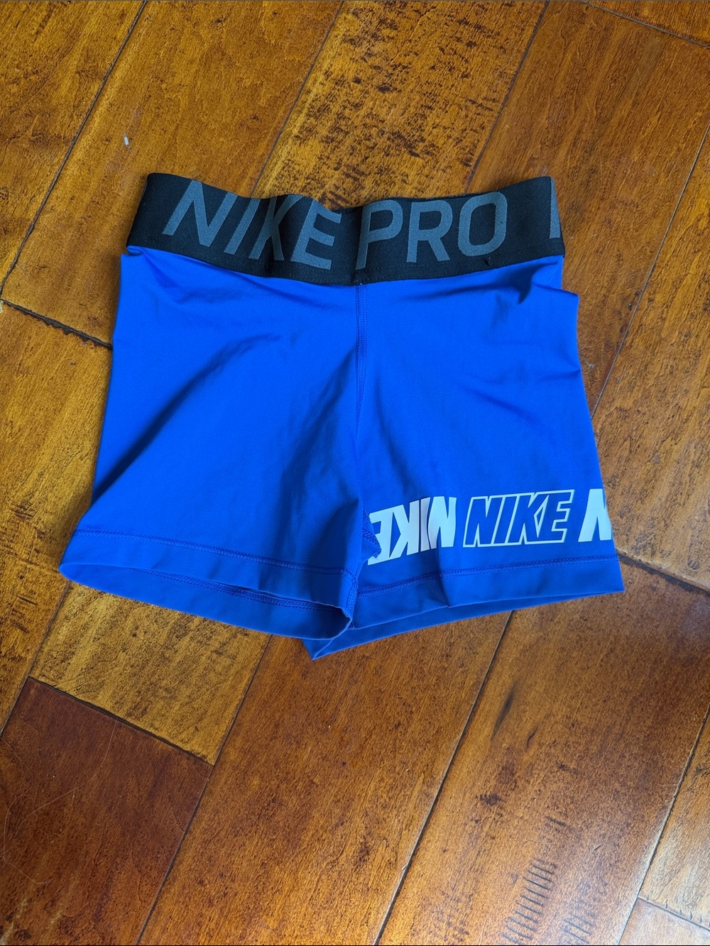 Nike Women's Blue Performance Compression Shorts with Black Waistband